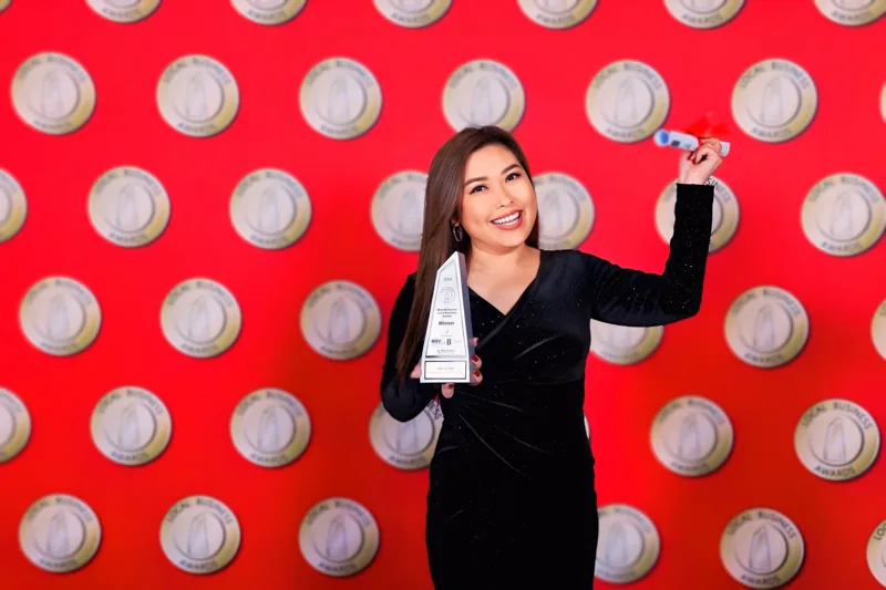 Tina Huynh with her 2024 Business Person of the Year award